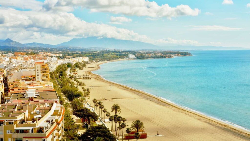 Aerial view of Estepona coastline in Costa del Sol, Spain, highlighting popular residential areas near the beach and some of the Best Areas to Buy Property in Estepona