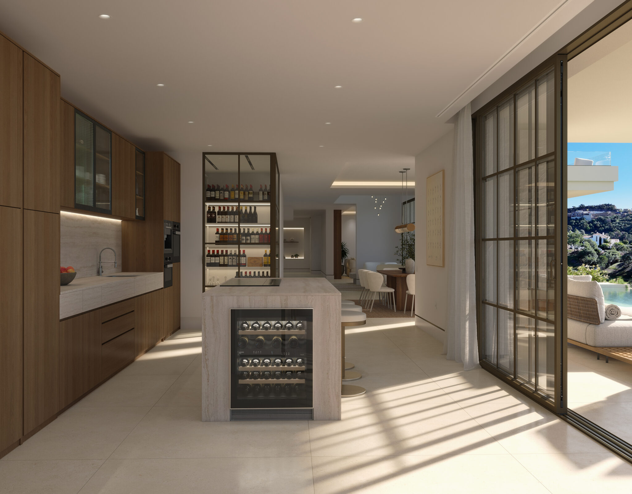 Luxury open-plan kitchen with wine cooler and terrace access in villa at Marbella Club Golf Resort Benahavís