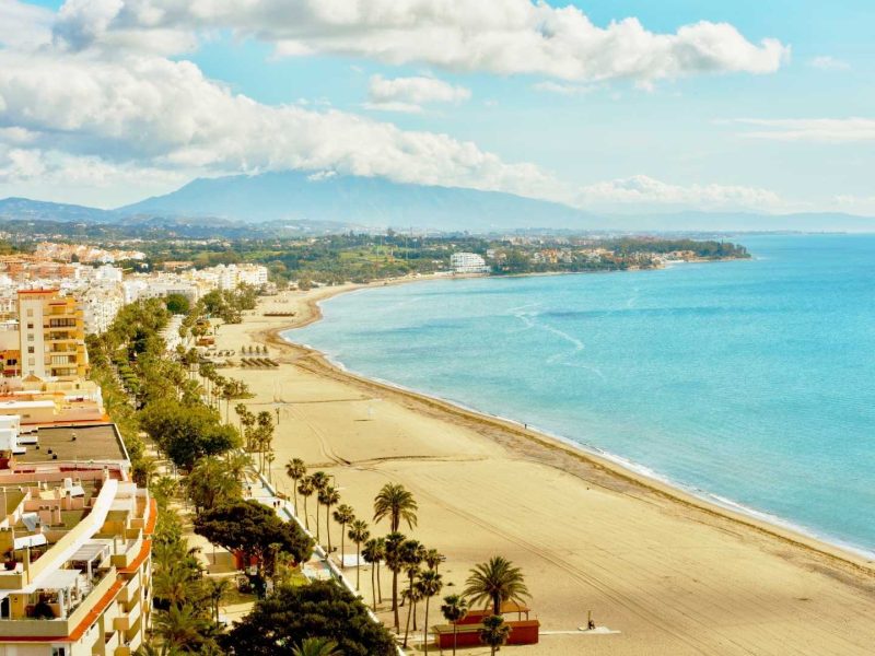 Aerial view of Estepona coastline in Costa del Sol, Spain, highlighting popular residential areas near the beach and some of the Best Areas to Buy Property in Estepona