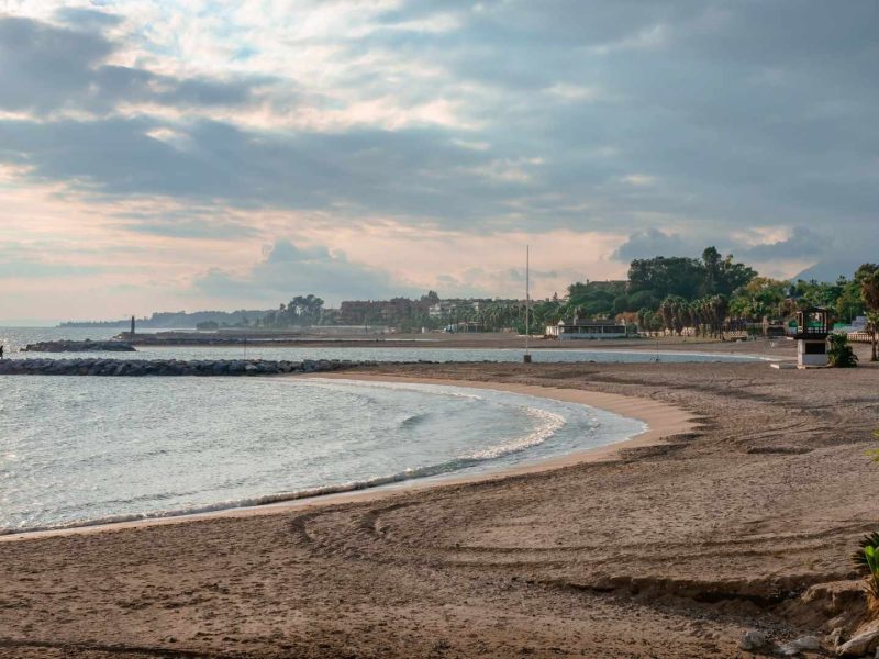 Scenic beachfront in Nueva Andalucia, Spain, near Modern Apartments for Sale in Nueva Andalucia, showcasing sea views and a relaxed coastal living appeal, ideal for Nueva Andalucia property investment.